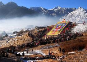 snow-covered land and thangka